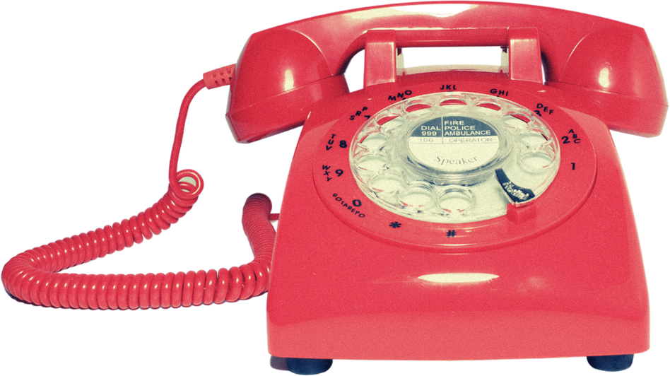 a red rotary telephone on a white background